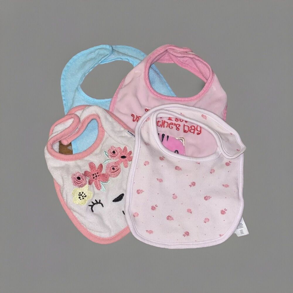 Lot Of Four Baby Girl Bibs And Three Pair Of Little Socks Mixed Brands